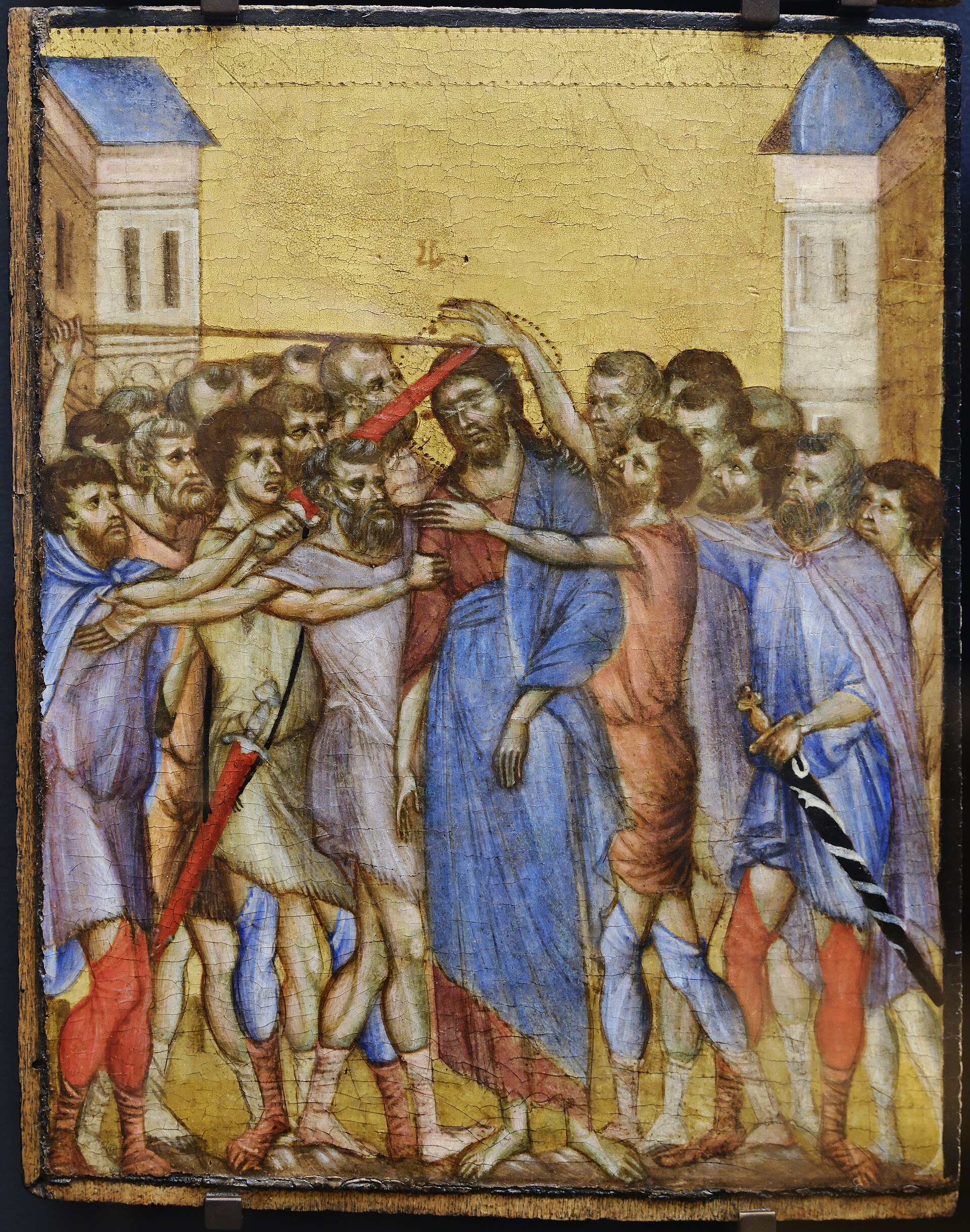 Christ surrounded and struck by a dense crowd of figures on a gold ground
